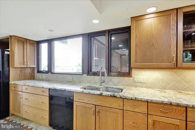 a view of an empty room with a sliding door