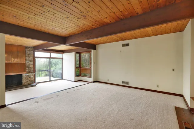 a view of a large room with a large window