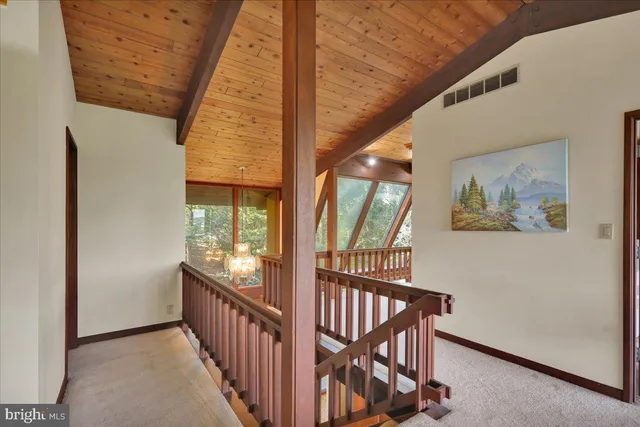 a bathroom with a tub and shower