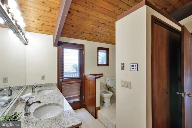 a view of empty room with windows