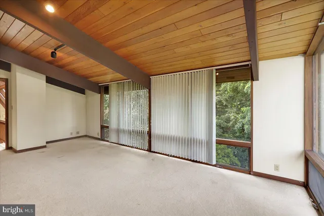 a bathroom with a sink a mirror and a shower
