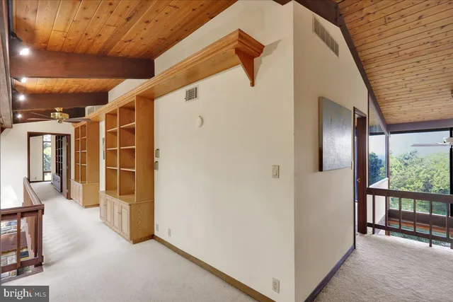 a view of cabinets and window