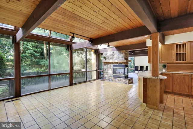 a kitchen with a stove and a sink