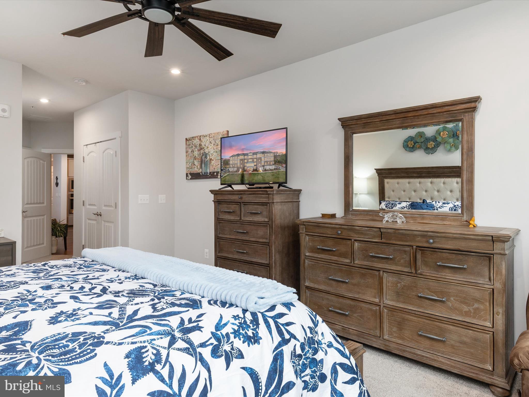 1000 Herons Nest Way, Unit 22 Chester, MD 21619 - Photo 25 of 59 a bedroom with a bed and a flat screen tv