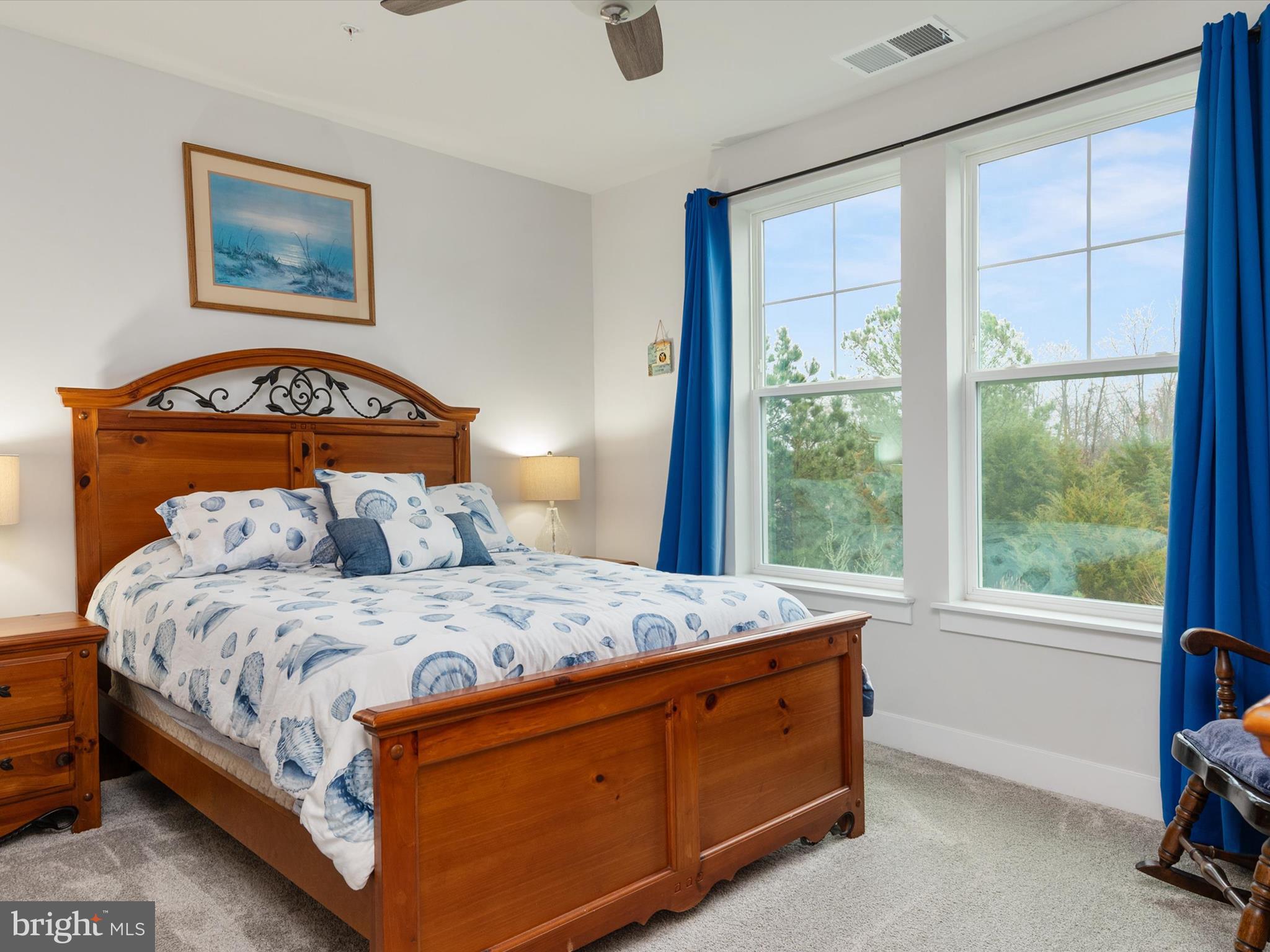 1000 Herons Nest Way, Unit 22 Chester, MD 21619 - Photo 29 of 59 a bedroom with a bed and a window