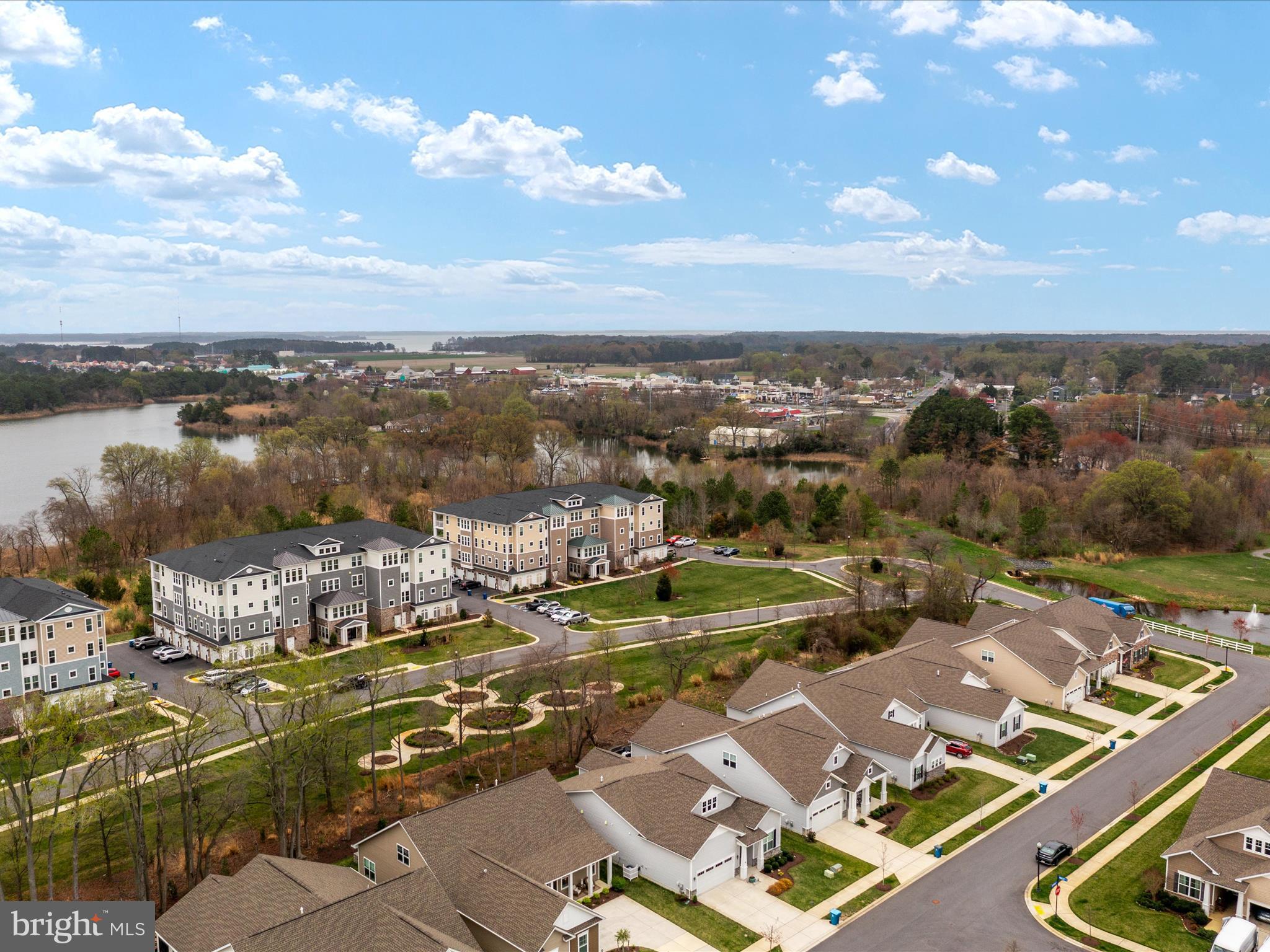 1000 Herons Nest Way, Unit 22 Chester, MD 21619 - Photo 37 of 59 an aerial view of a city with lots of residential buildings