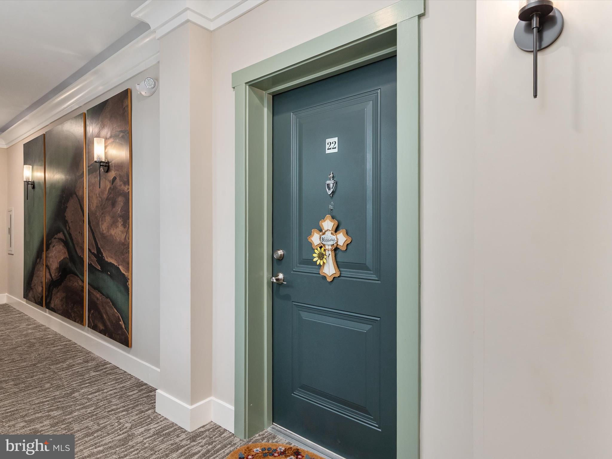 1000 Herons Nest Way, Unit 22 Chester, MD 21619 - Photo 8 of 59 a view of a hallway with wooden floor