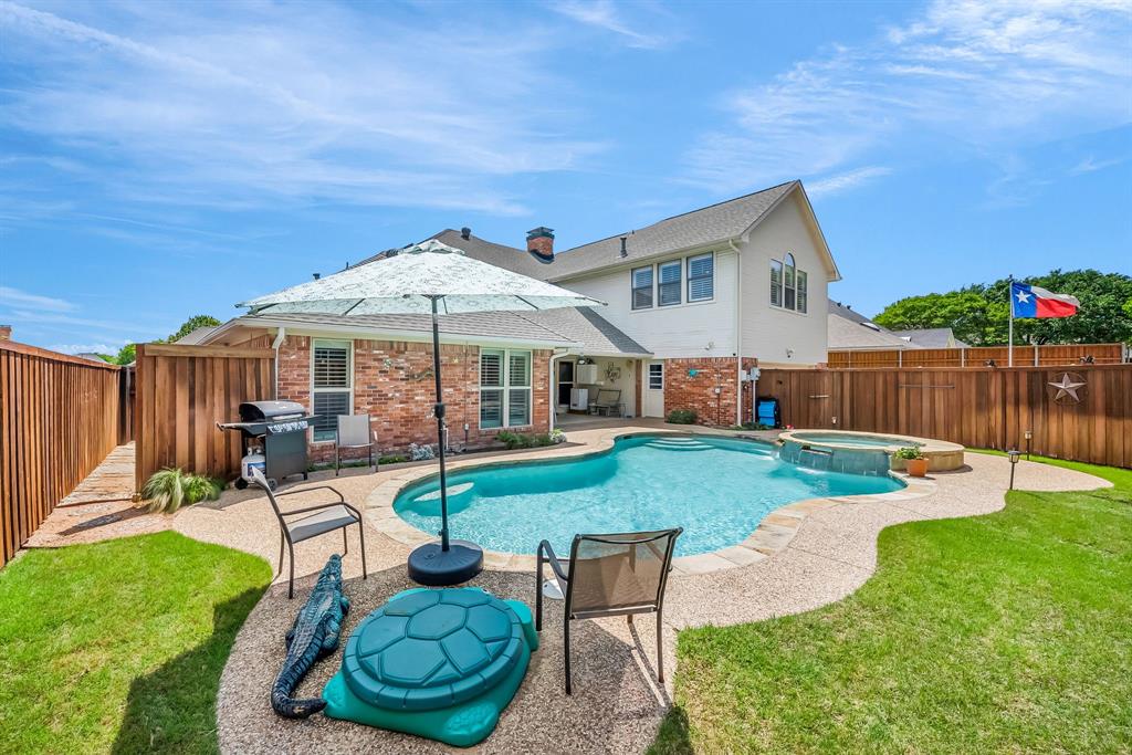 1409 Thames Drive Plano, TX 75075 - Photo 1 of 1 a view of a house with backyard sitting area and garden