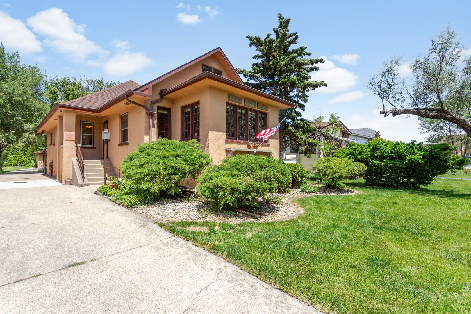 342 Lawton Road Riverside, IL 60546 - Photo 27 of 33 a front view of a house with a yard