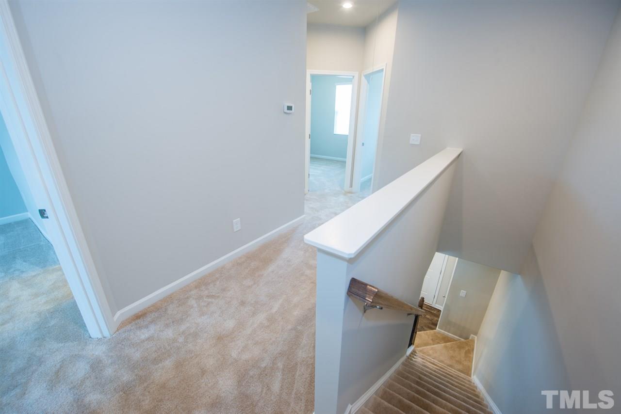 8864 Commons Townes Drive, Unit 52 Raleigh, NC 27616 - Photo 8 of 16 Example Upstairs Hallway