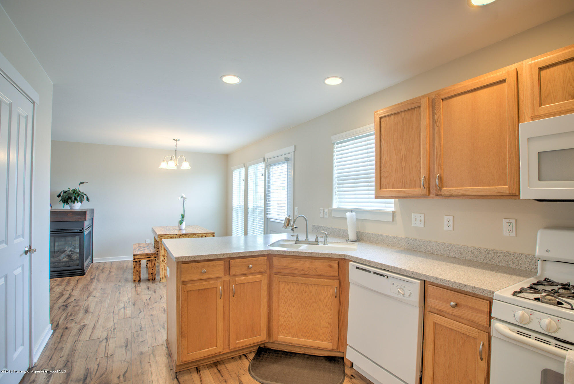 779 East 17th Street Rifle, CO 81650 - Photo 11 of 21 a kitchen with a sink cabinets and window