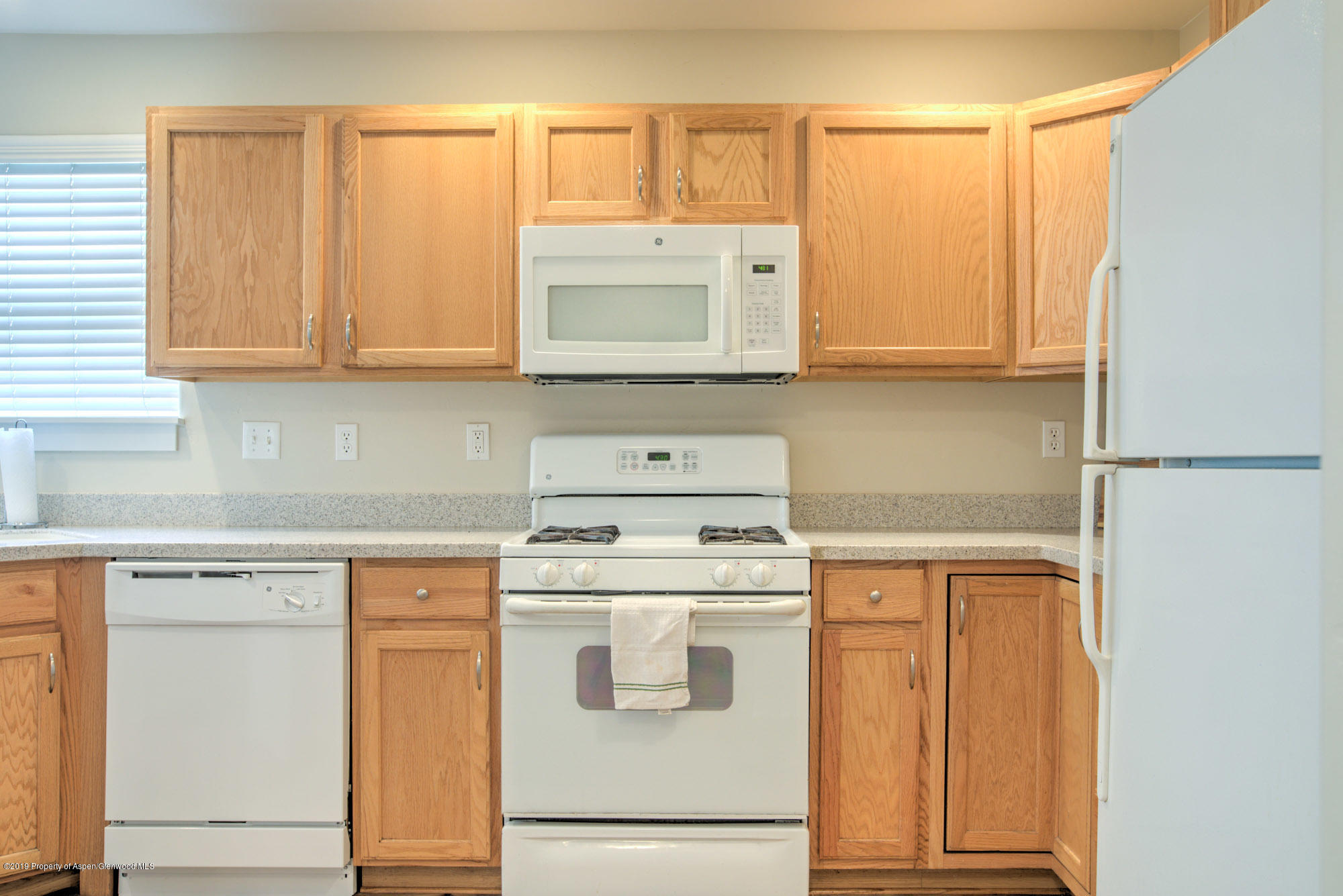 779 East 17th Street Rifle, CO 81650 - Photo 12 of 21 a kitchen with cabinets appliances