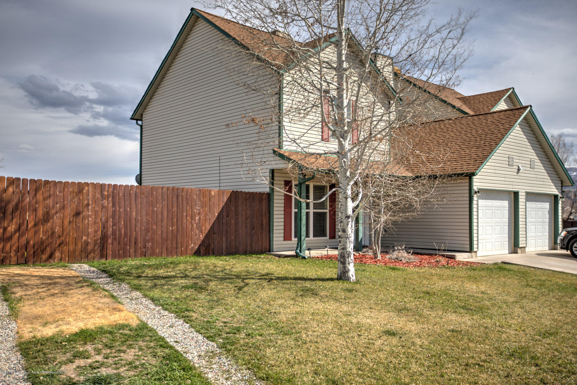 779 East 17th Street Rifle, CO 81650 - Photo 3 of 21 a view of a house with basketball court