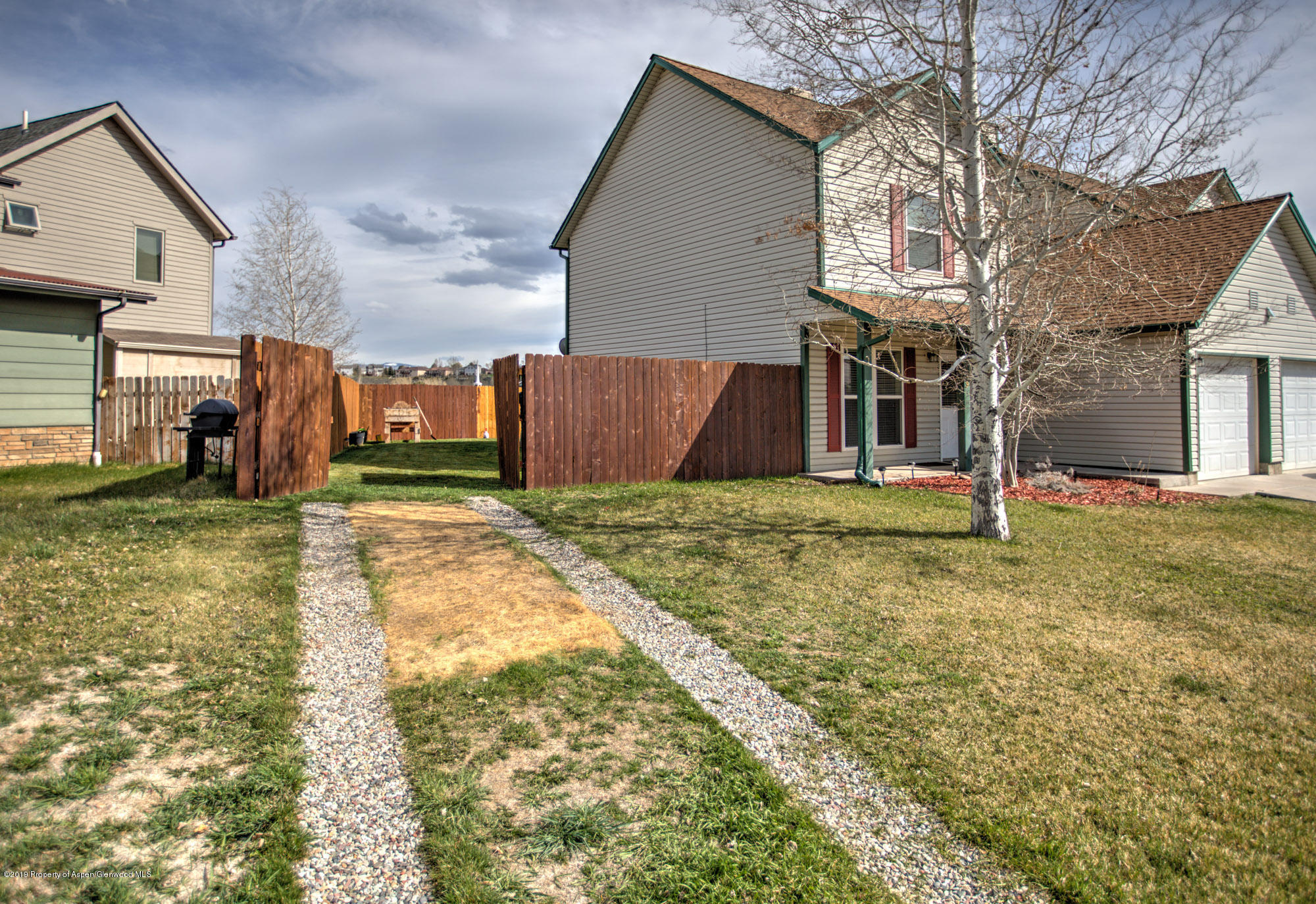 779 East 17th Street Rifle, CO 81650 - Photo 4 of 21 a view of a house with a yard