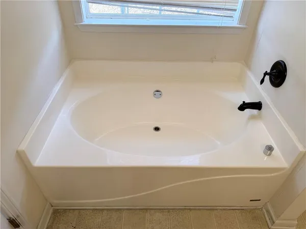 a bathroom with a bathtub