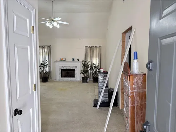 a view of a livingroom with a fireplace