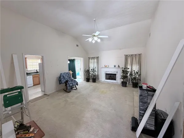 a view of a livingroom with a furniture and a flat screen tv