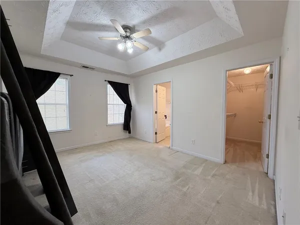 wooden floor in an empty room with a mirror