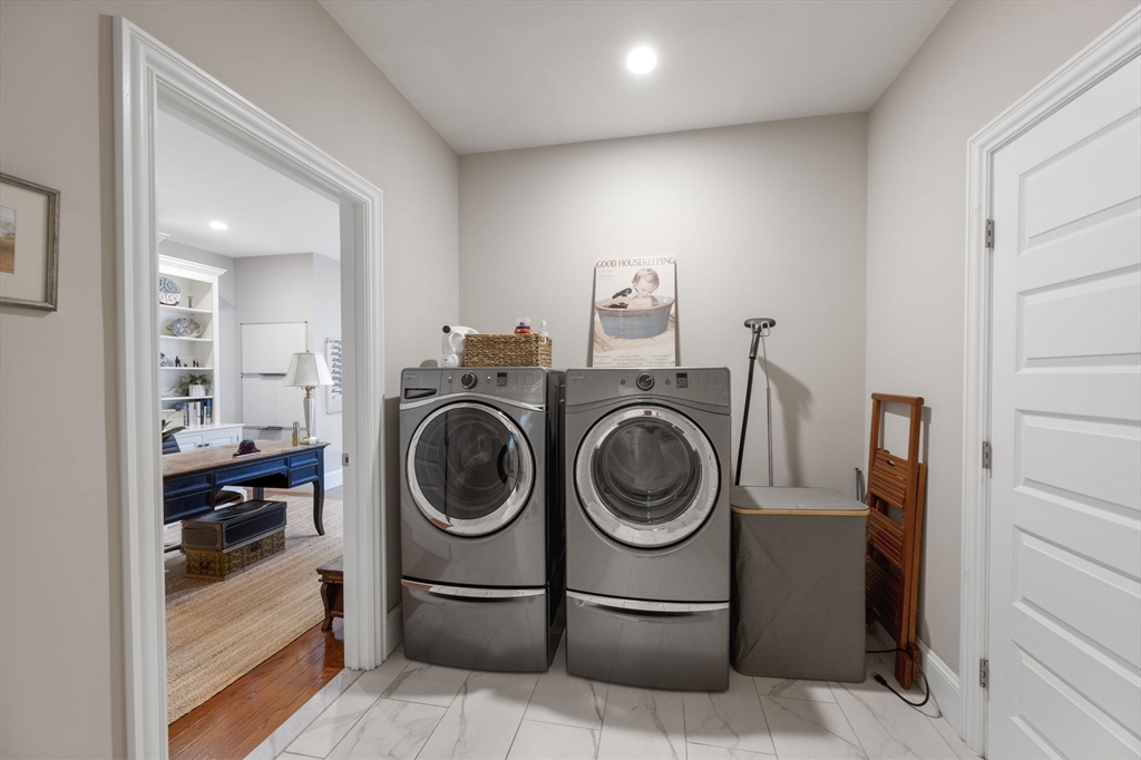 10 Backriver Road, Unit 10 Hingham, MA 02043 - Photo 15 of 31 a view of a storage & utility room with washer and dryer