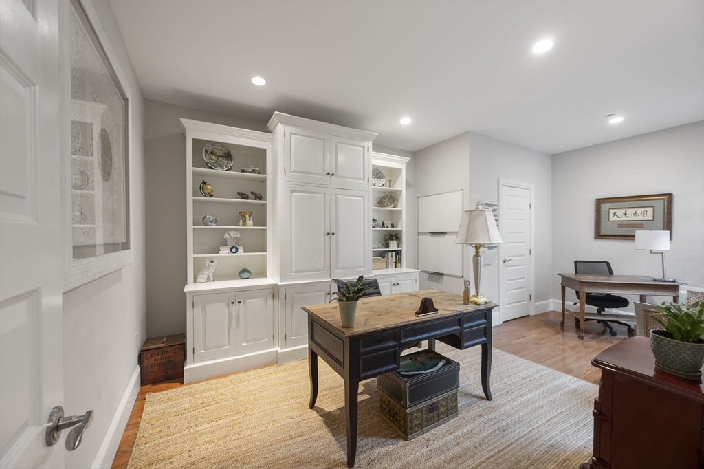 10 Backriver Road, Unit 10 Hingham, MA 02043 - Photo 16 of 31 a living room with furniture a rug and a window