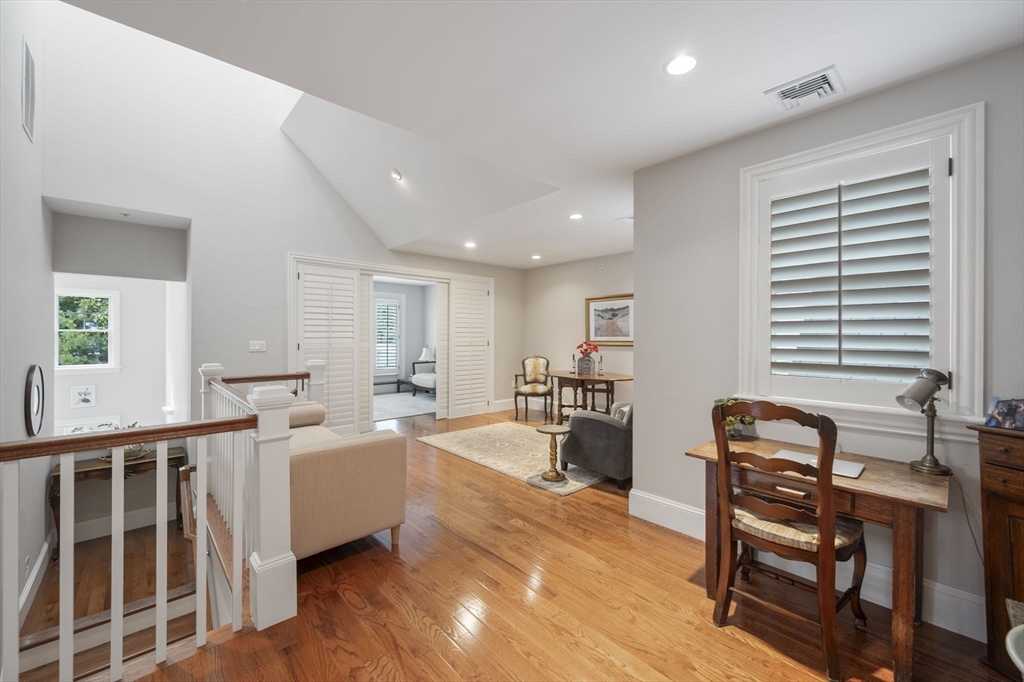 10 Backriver Road, Unit 10 Hingham, MA 02043 - Photo 20 of 31 a living room with furniture and a window