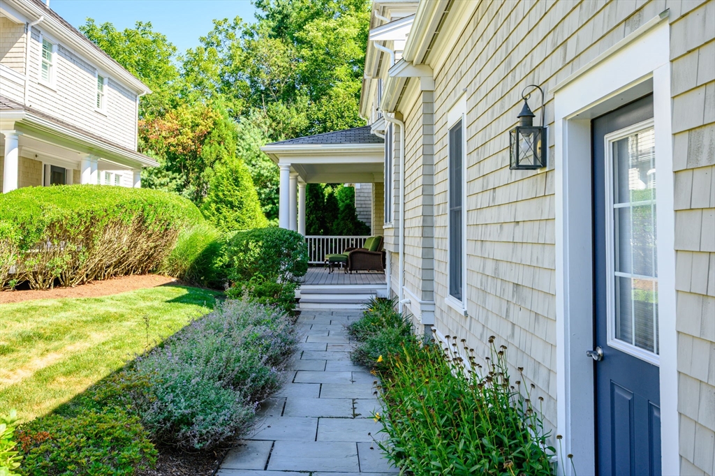 10 Backriver Road, Unit 10 Hingham, MA 02043 - Photo 2 of 31 a view of a back yard of the house