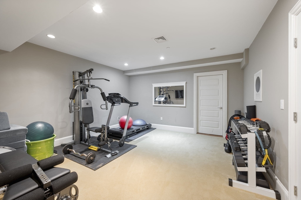 10 Backriver Road, Unit 10 Hingham, MA 02043 - Photo 23 of 31 a view of a room with gym equipment