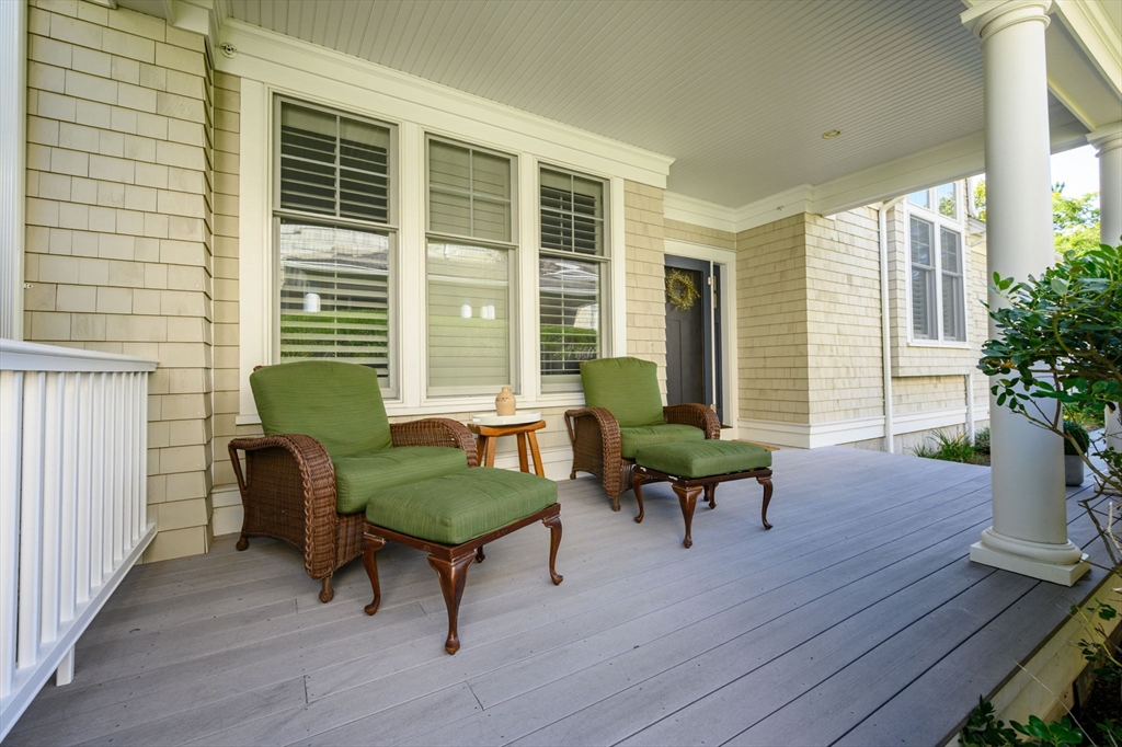10 Backriver Road, Unit 10 Hingham, MA 02043 - Photo 3 of 31 a living room filled with furniture and a potted plant