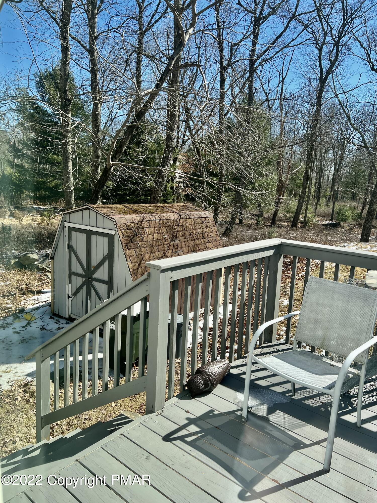 152 Caribou Road Dingmans Ferry, PA 18328 - Photo 14 of 15 a view of a balcony with chairs