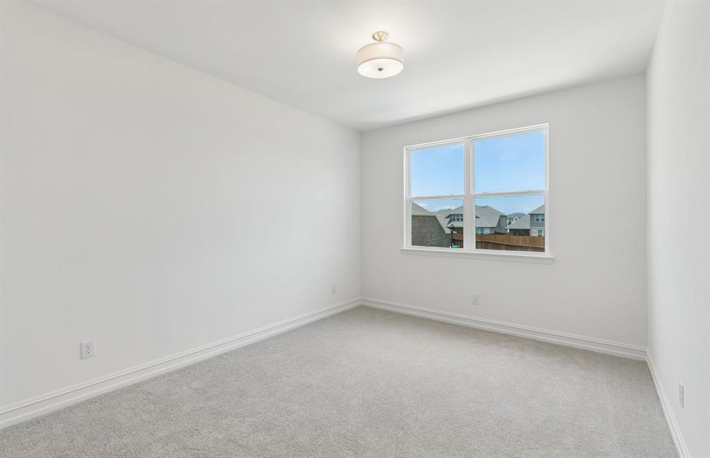 11220 Abbotsbury Road Fort Worth, TX 76052 - Photo 23 of 32 an empty room with a window