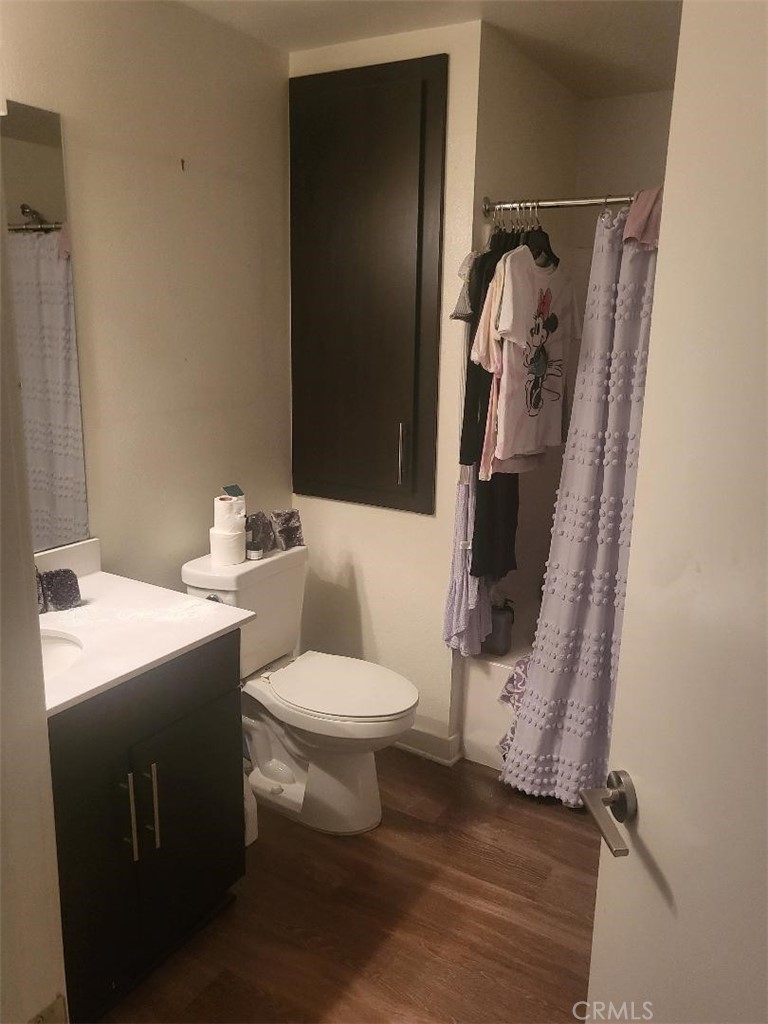 612 East Carson Street, Unit 202 Carson, CA 90745 - Photo 14 of 24 a bathroom with a sink toilet and shower