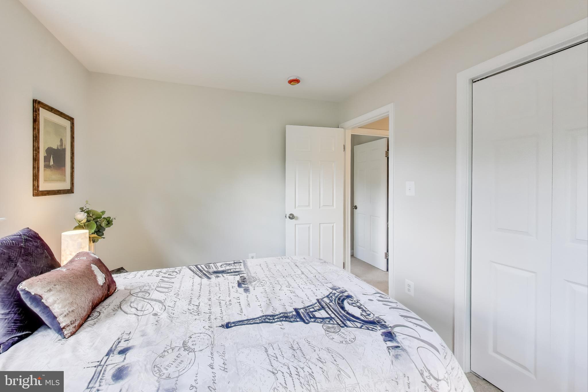 2107 Patrick Street Woodbridge, VA 22191 - Photo 11 of 28 a bedroom with a bed and a couch