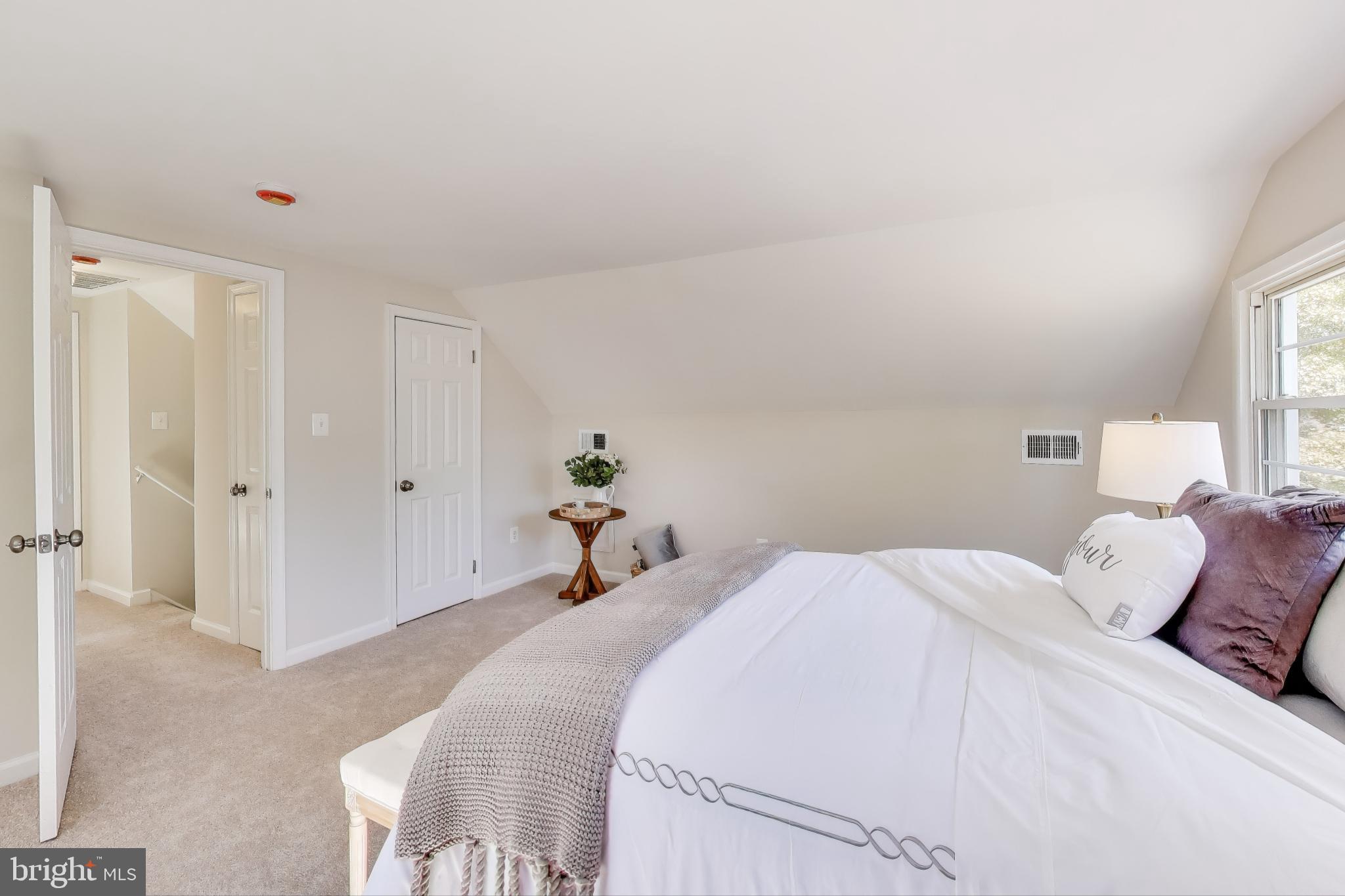 2107 Patrick Street Woodbridge, VA 22191 - Photo 14 of 28 a bedroom with a bed and a cabinets