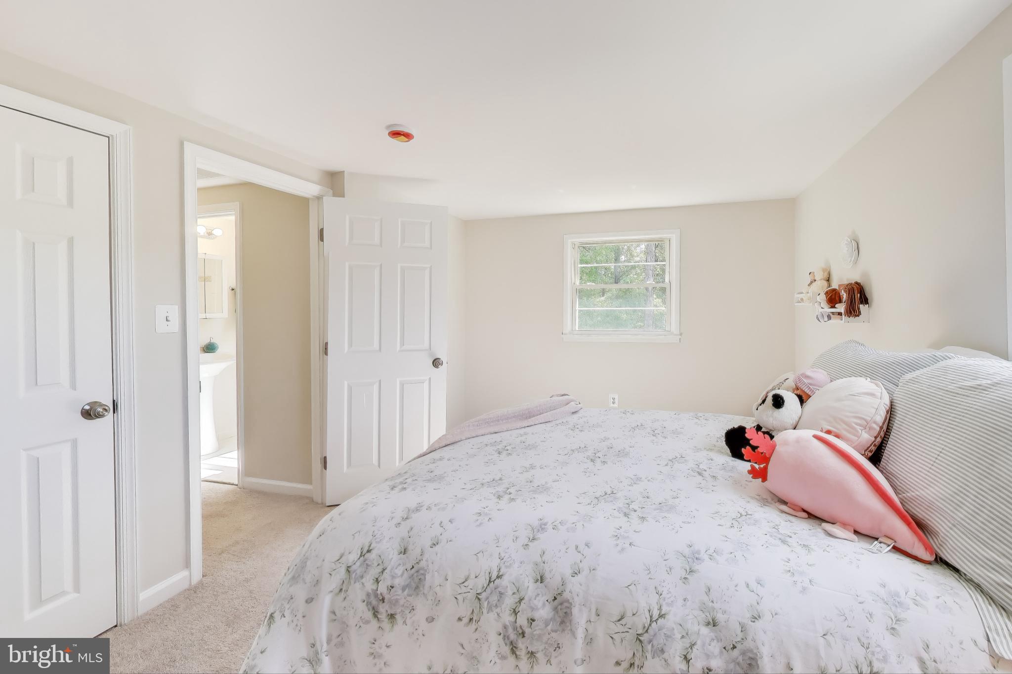 2107 Patrick Street Woodbridge, VA 22191 - Photo 17 of 28 a bedroom with a bed and a window