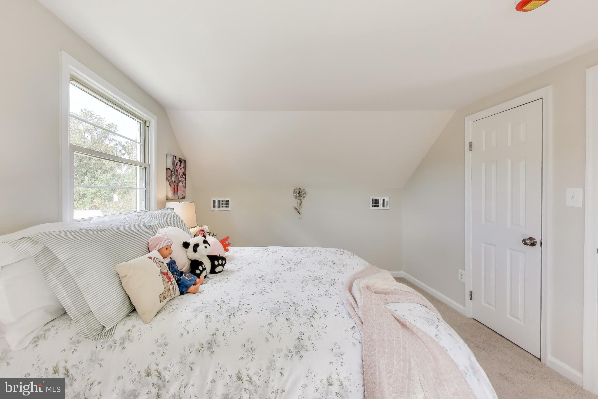 2107 Patrick Street Woodbridge, VA 22191 - Photo 18 of 28 a bedroom with a bed and window