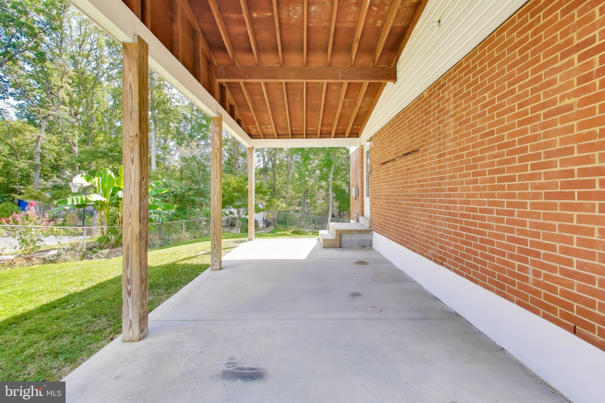 2107 Patrick Street Woodbridge, VA 22191 - Photo 25 of 28 a view of porch with green space