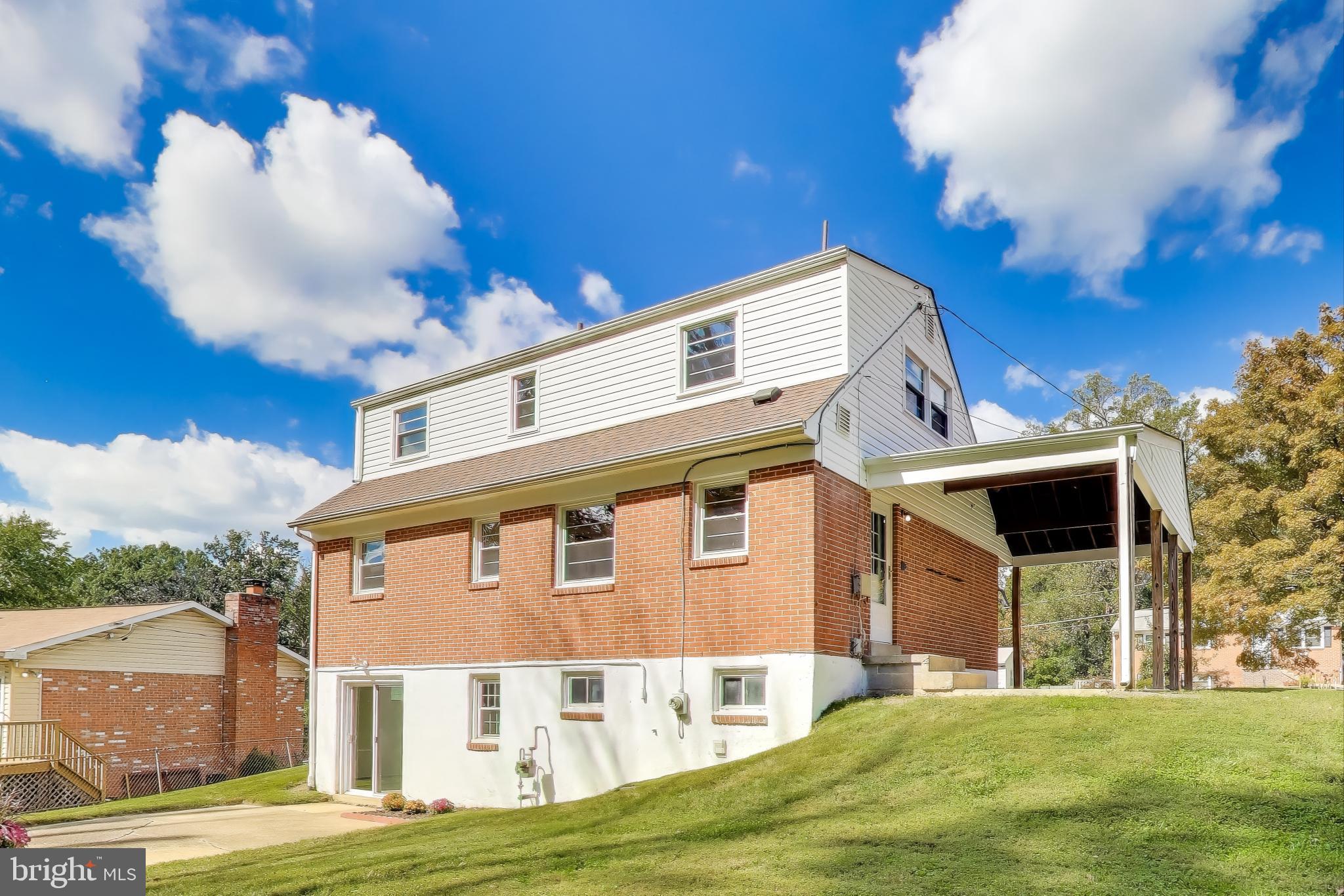2107 Patrick Street Woodbridge, VA 22191 - Photo 26 of 28 a view of a house with a yard