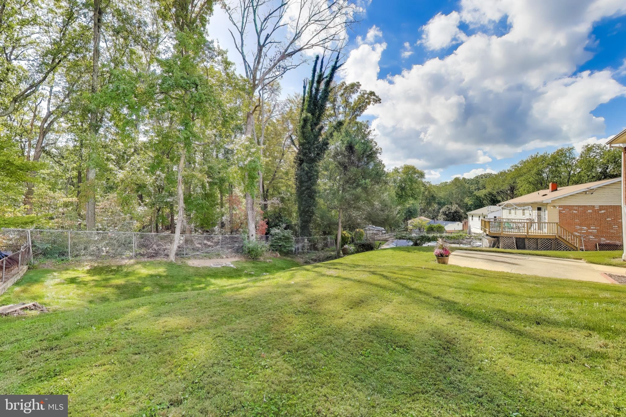2107 Patrick Street Woodbridge, VA 22191 - Photo 28 of 28 a swimming pool with trees in the background