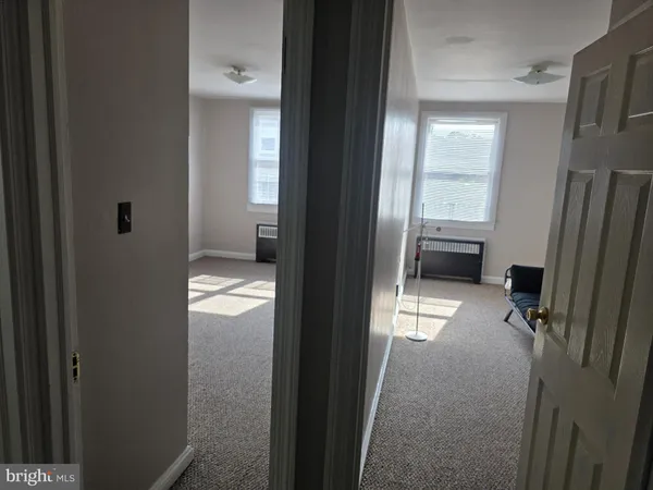 a view of a room with a window