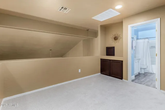 a view of a room with a large window