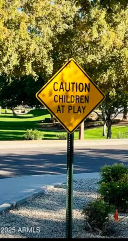 a sign on the side of a road