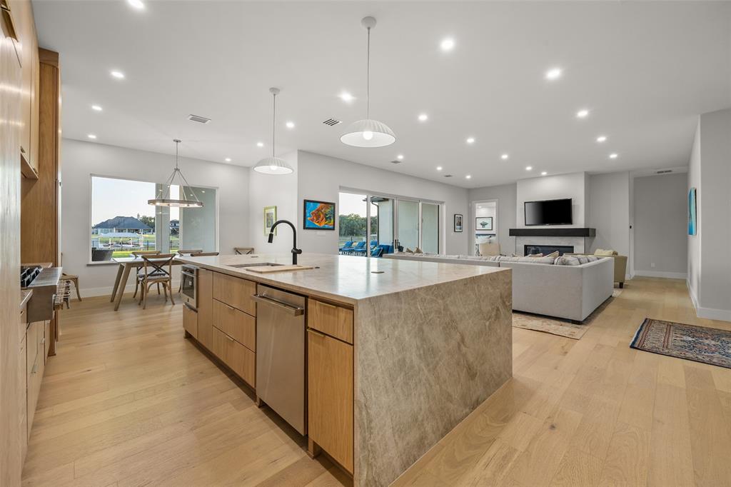 1532 Laguna Bay West Azle, TX 76020 - Photo 13 of 40 a large kitchen with stainless steel appliances lots of counter top space