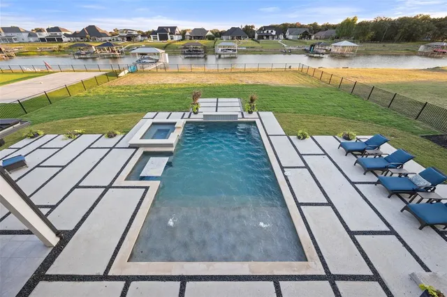 a view of a lake with a yard