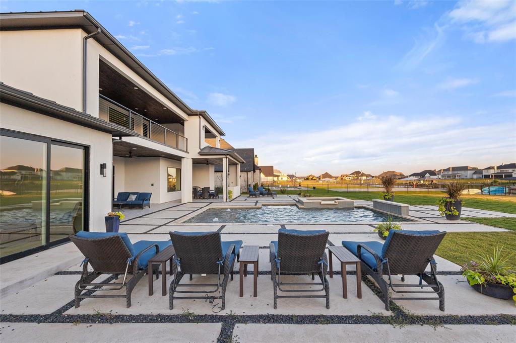 1532 Laguna Bay West Azle, TX 76020 - Photo 35 of 40 a view of chairs and table on the terrace