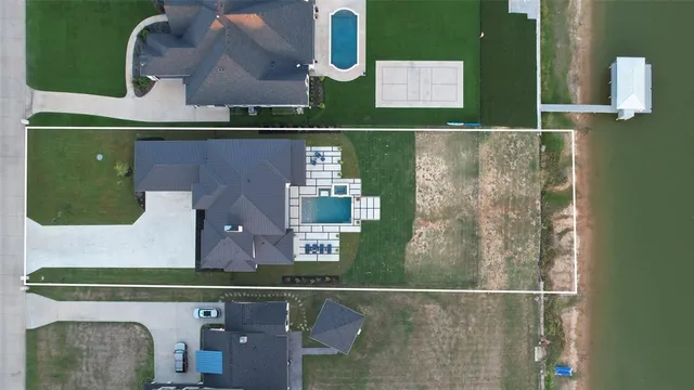 an aerial view of houses and roads