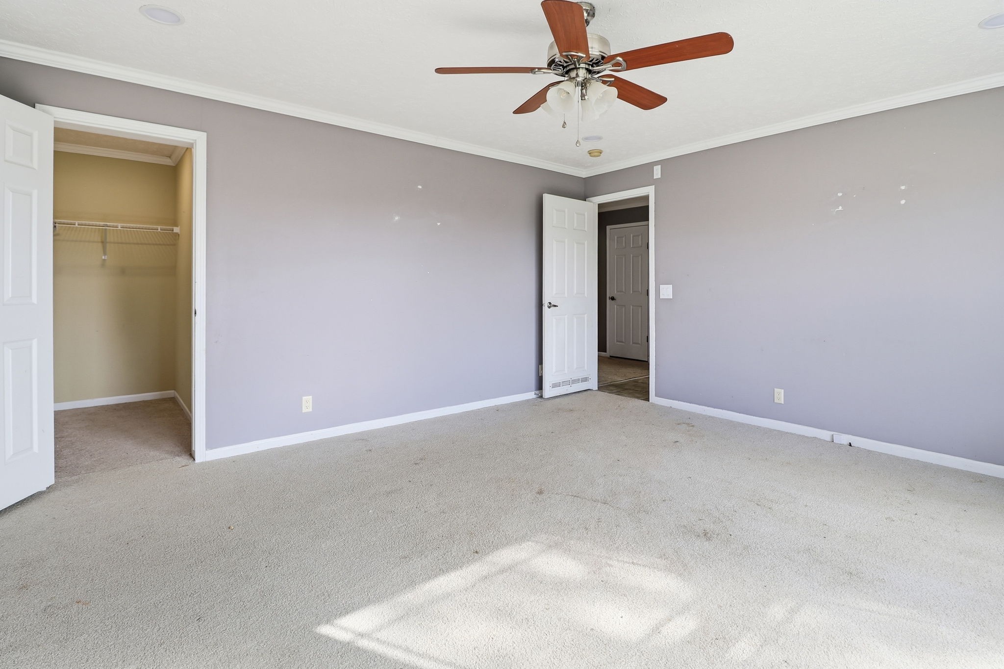 166 Carlton Road Chapel Hill, TN 37034 - Photo 18 of 27 an empty room with closet and a chandelier fan