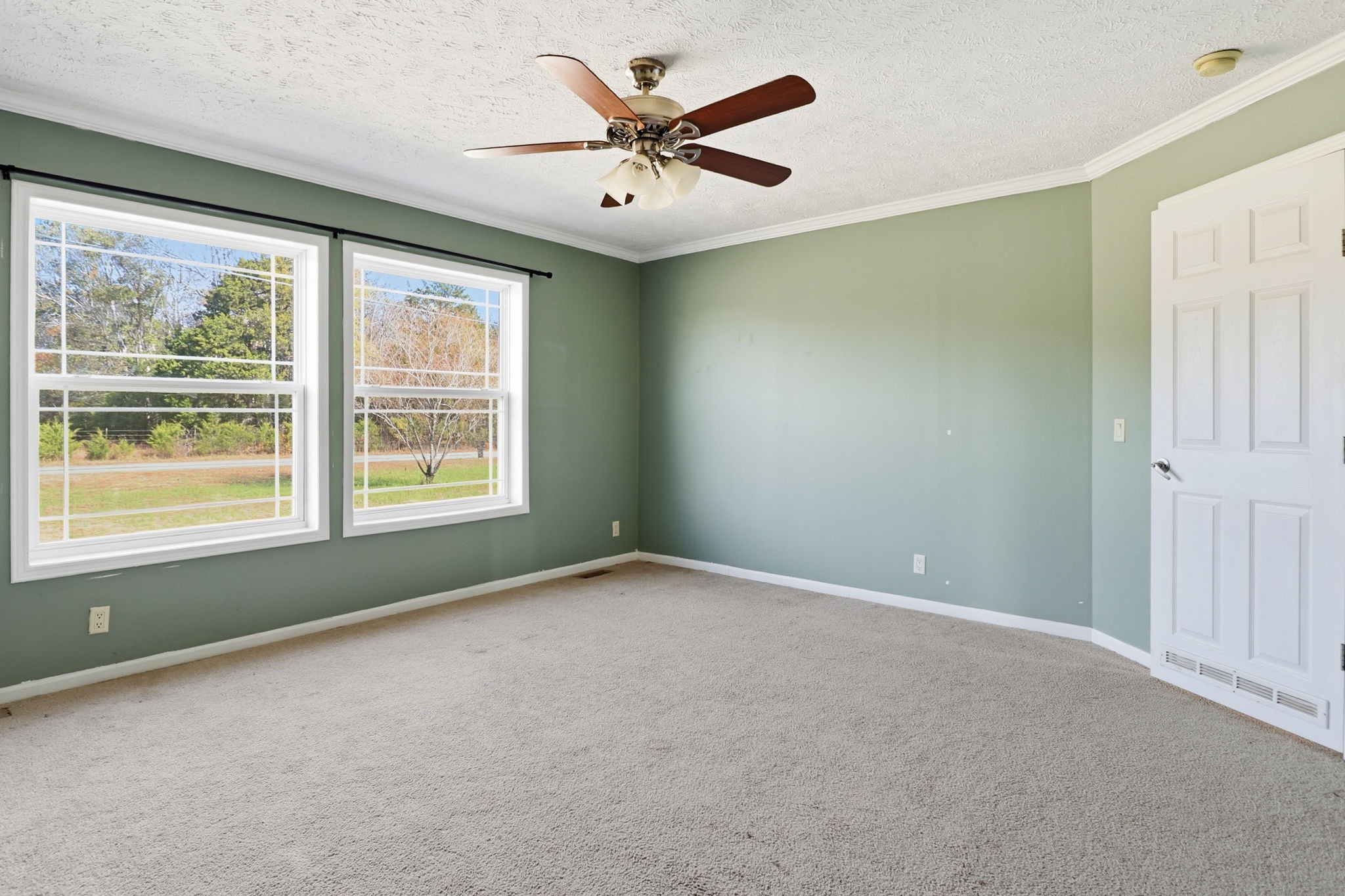 166 Carlton Road Chapel Hill, TN 37034 - Photo 19 of 27 an empty room with windows and fan