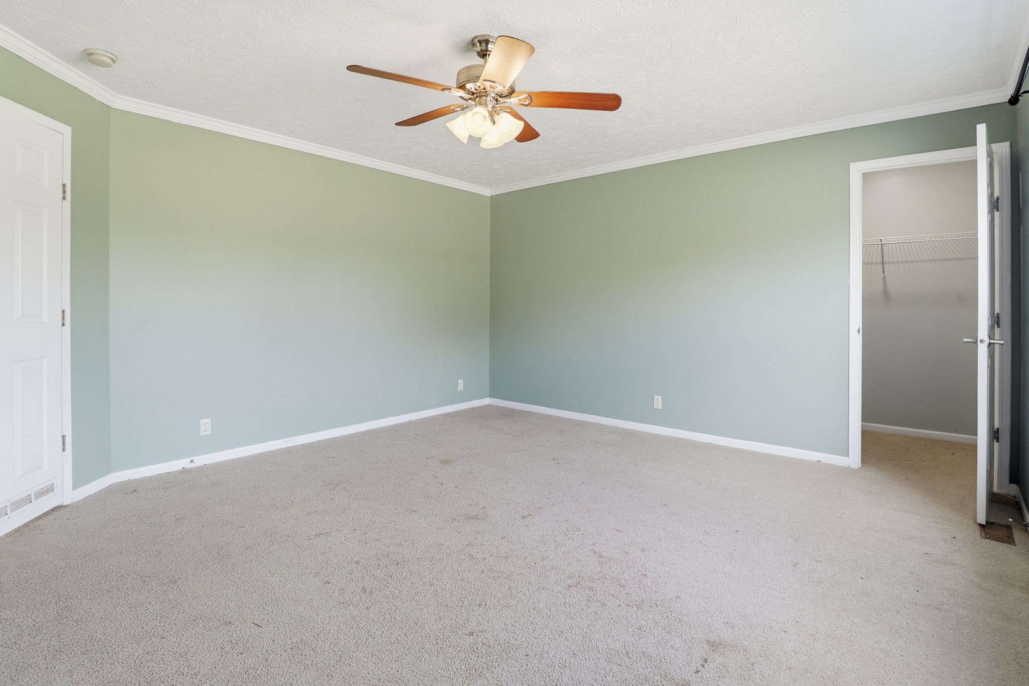 166 Carlton Road Chapel Hill, TN 37034 - Photo 20 of 27 an empty room with a window and a fan