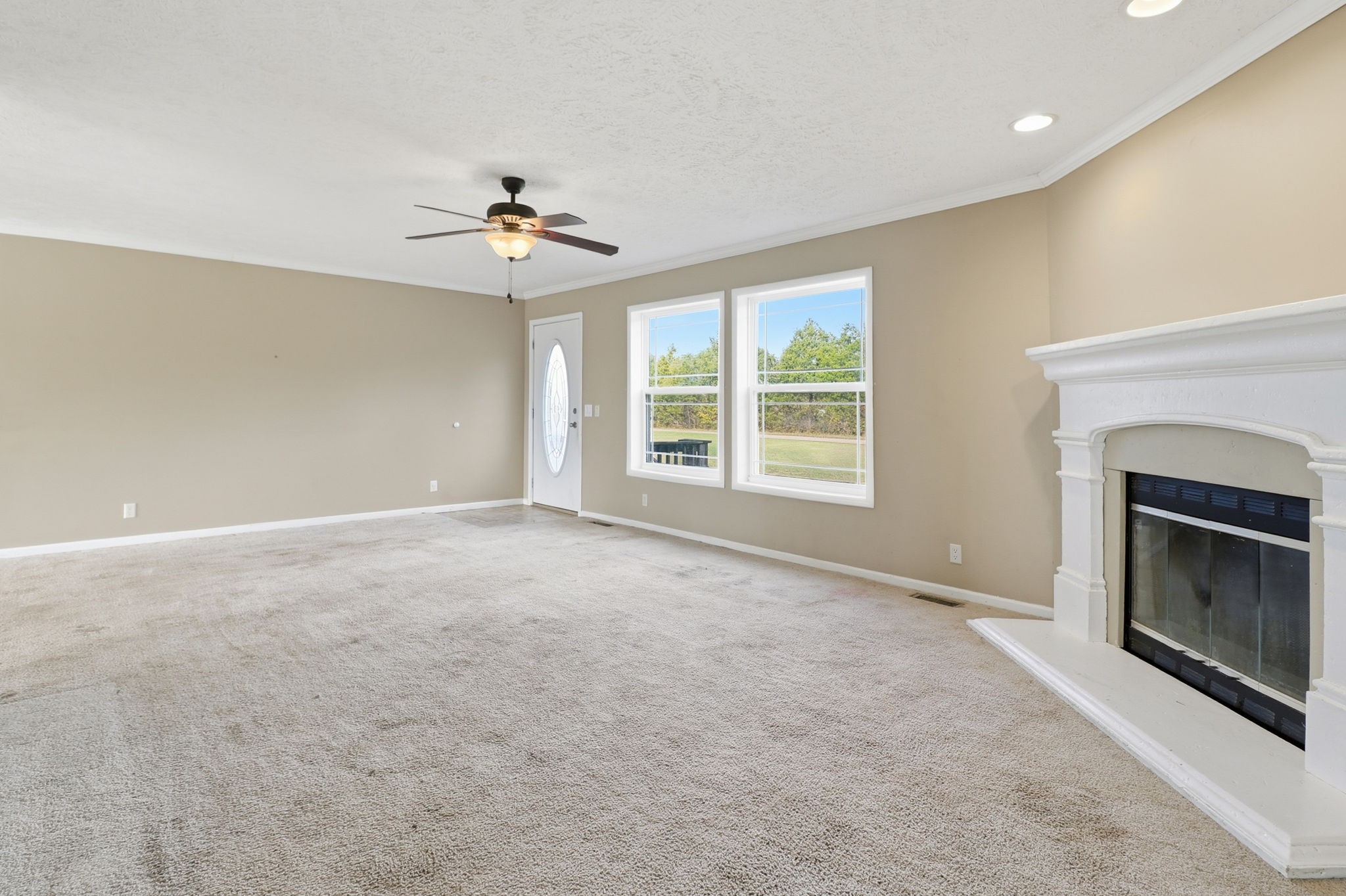 166 Carlton Road Chapel Hill, TN 37034 - Photo 10 of 27 a view of empty room with fireplace and fan