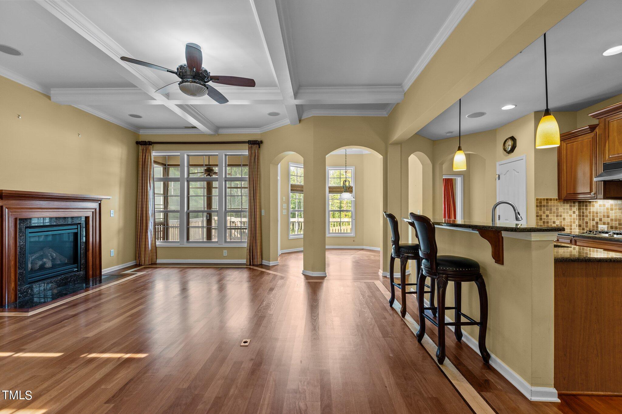 6112 Blakeman Lane Raleigh, NC 27617 - Photo 13 of 56 a view of a room with furniture and a fireplace